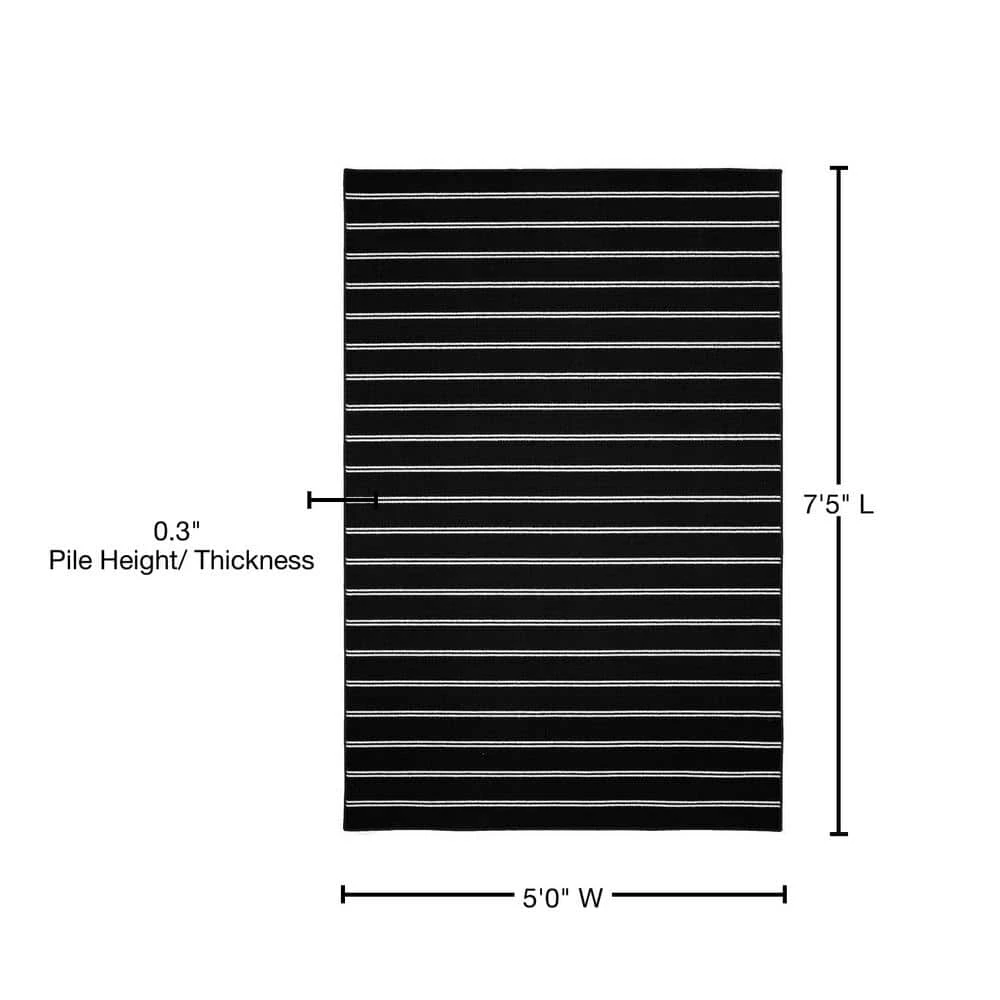 Avery Black 5 ft. x 7 ft. Area Rug by Garland Rug 9 Avery Black 5 ft. x 7 ft. Area Rug by Garland Rug - Image 7