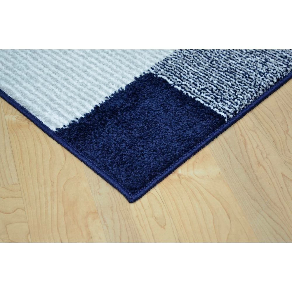 Block Party Navy/Sterling/White 5 ft. x 7 ft. Polypropylene Area Rug by Garland Rug 4 Block Party Navy/Sterling/White 5 ft. x 7 ft. Polypropylene Area Rug by Garland Rug - Image 2